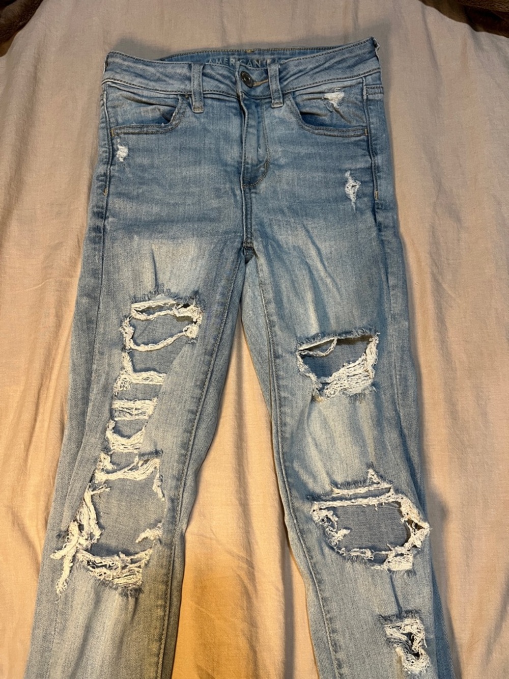 American Eagle Outfitters Light Blue Distressed Skinny Jeans